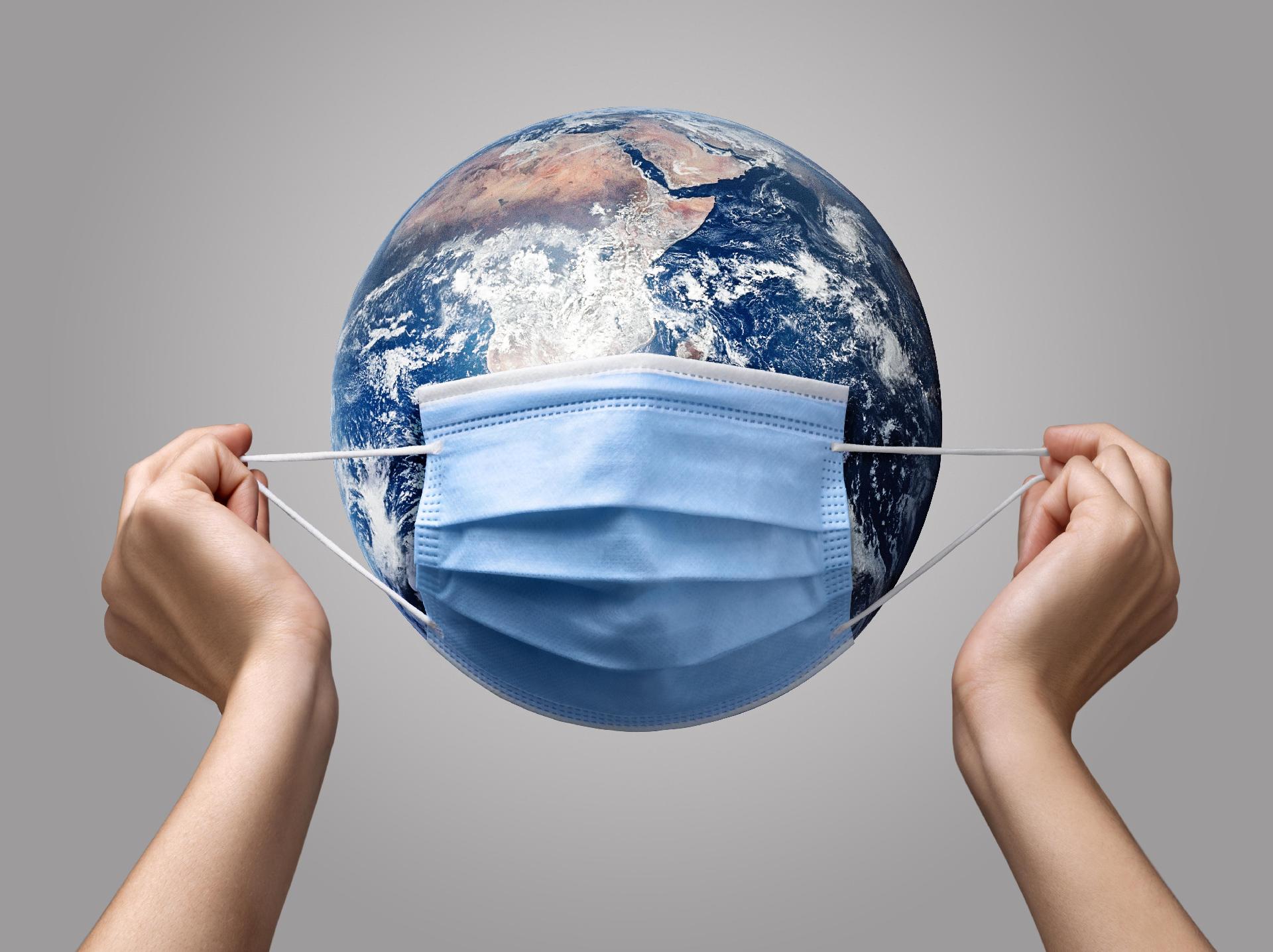person-putting-medical-mask-earth.jpg